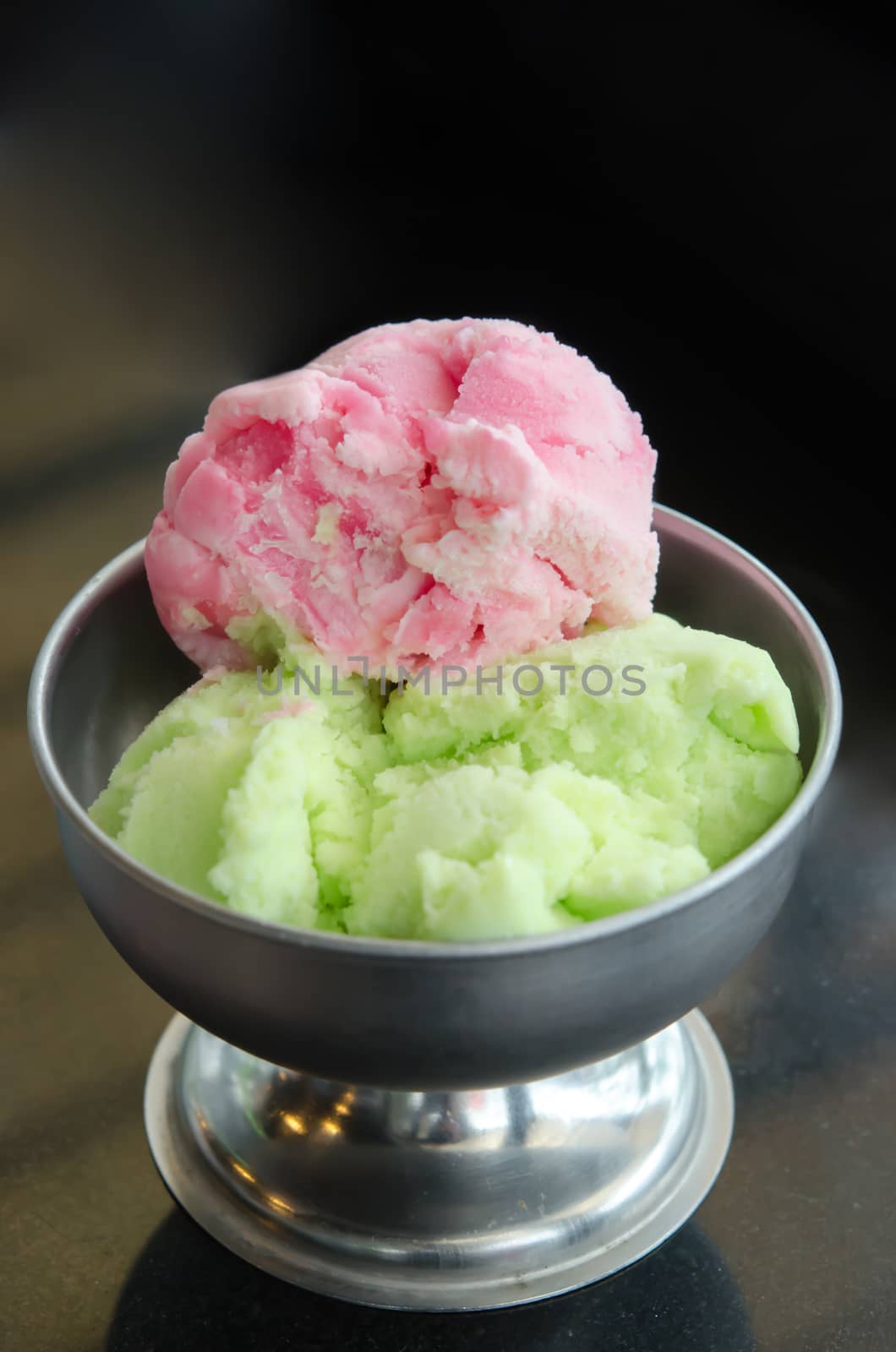 sweet dessert , strawberry ice cream  and green tea ice cream in  bowl