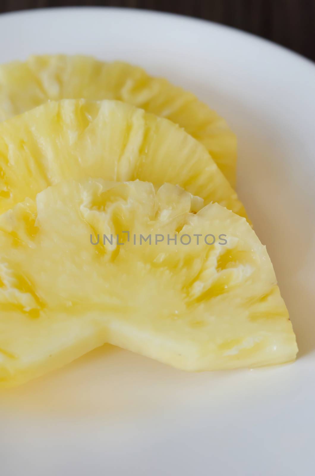 close up  pineapple  on dish , fruits for healthy eating