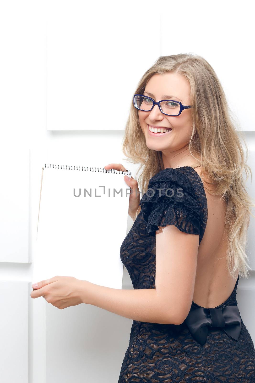 Portrait of the business woman with a represent folder.