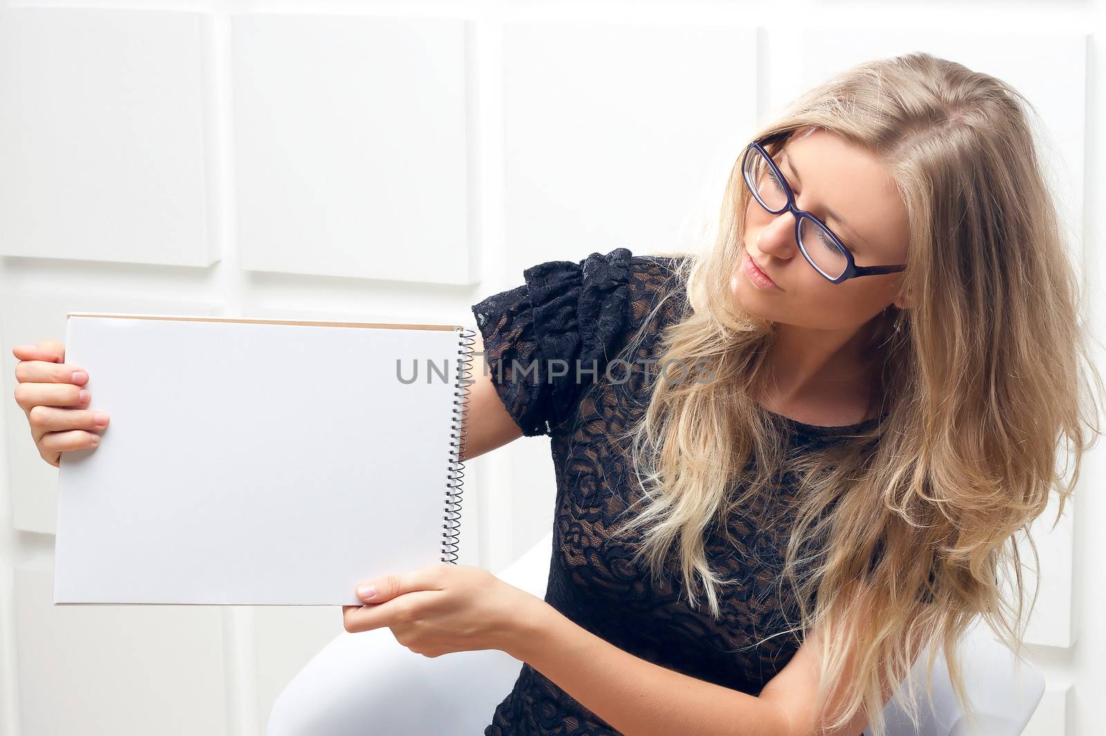 Portrait of the business woman with a represent folder.