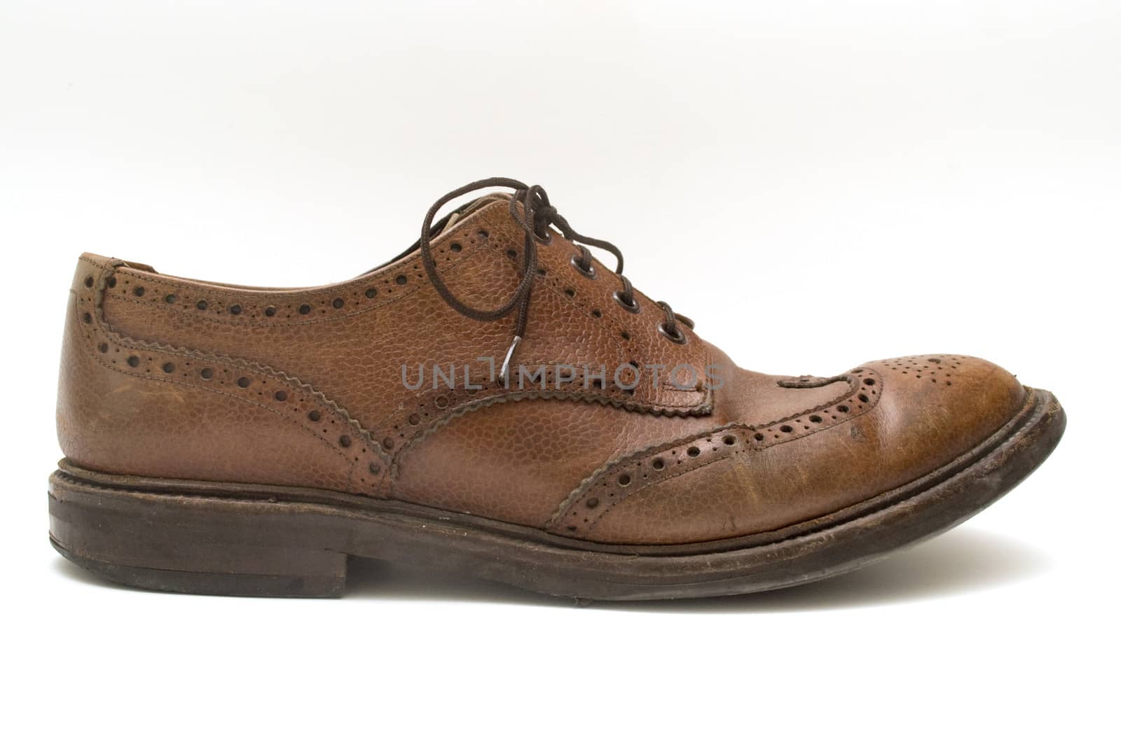 Detail image of a man brown shoe