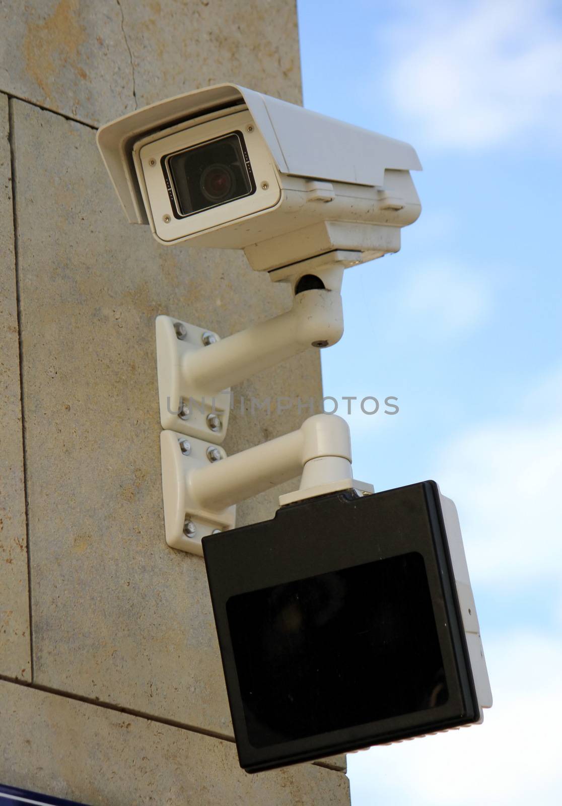 Security camera and screen under by Elenaphotos21