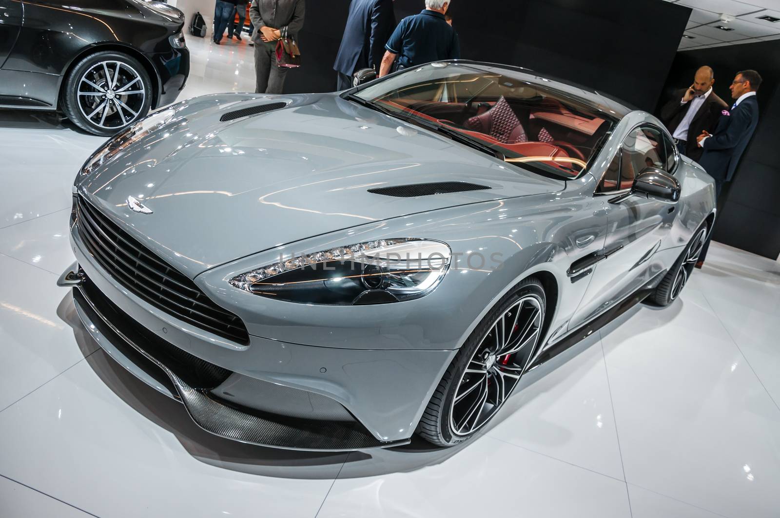FRANKFURT - SEPT 21: Aston Martin Vanquish Coupe presented as world premiere at the 65th IAA (Internationale Automobil Ausstellung) on September 21, 2013 in Frankfurt, Germany