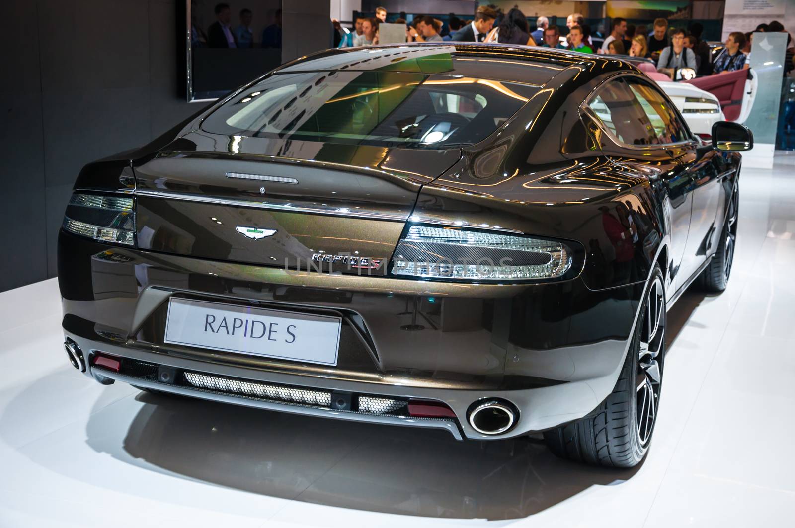 FRANKFURT - SEPT 21: Aston Martin Rapide S presented as world premiere at the 65th IAA (Internationale Automobil Ausstellung) on September 21, 2013 in Frankfurt, Germany
