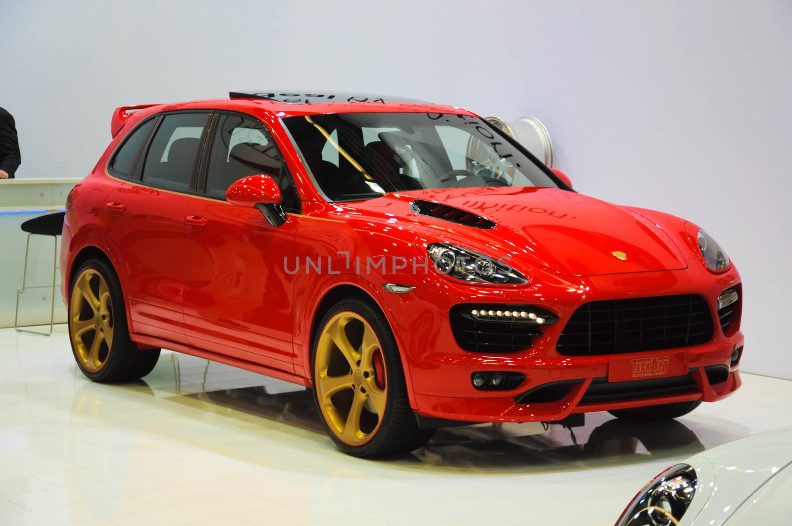 FRANKFURT - SEPT 21: Porsche Cayenne Magnum Gold Edition (Techart) presented as world premiere at the 65th IAA (Internationale Automobil Ausstellung) on September 21, 2013 in Frankfurt, Germany