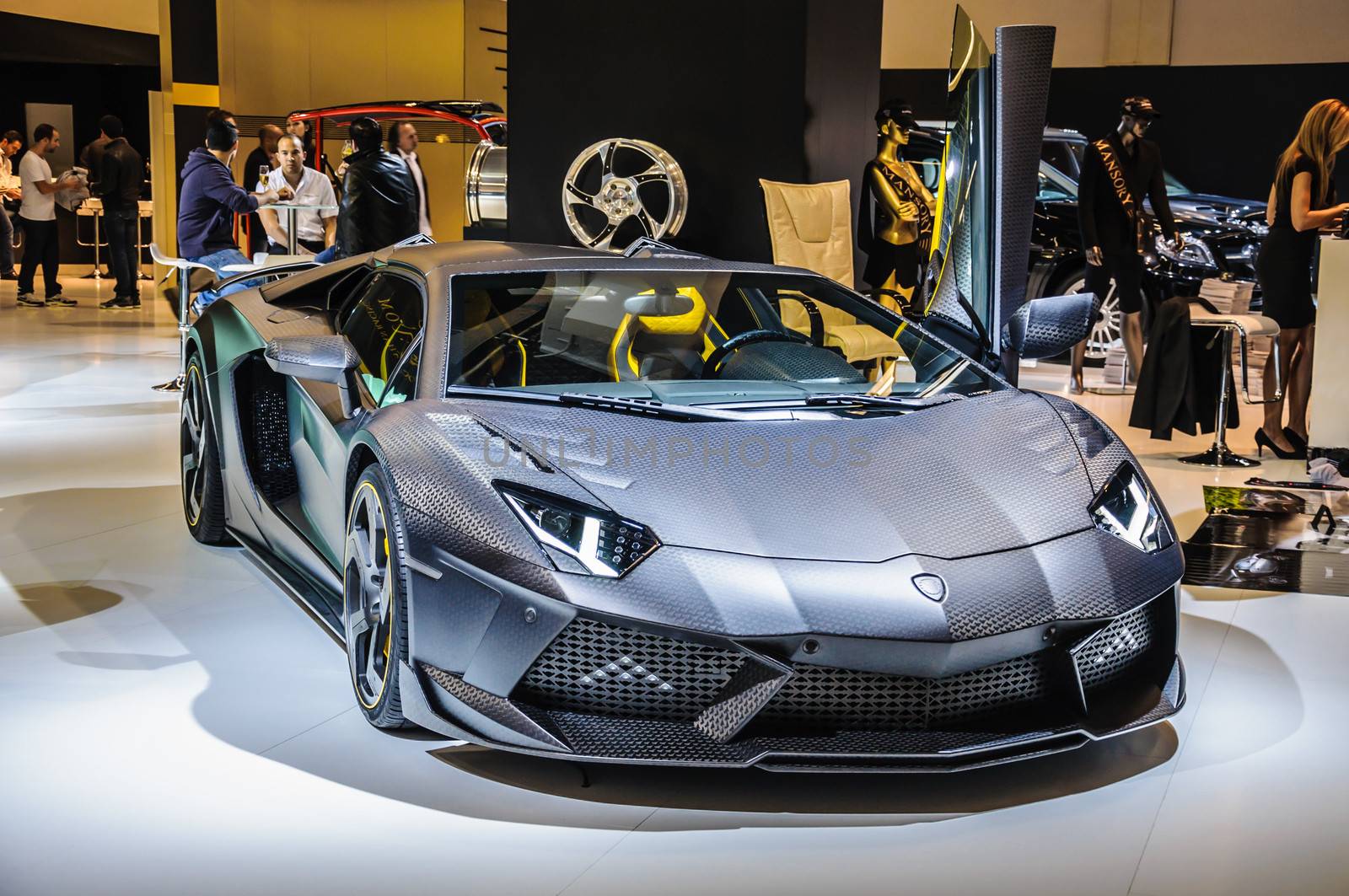 FRANKFURT - SEPT 21: Lamborghini Aventador Carbonado by Mansory presented as world premiere at the 65th IAA (Internationale Automobil Ausstellung) on September 21, 2013 in Frankfurt, Germany