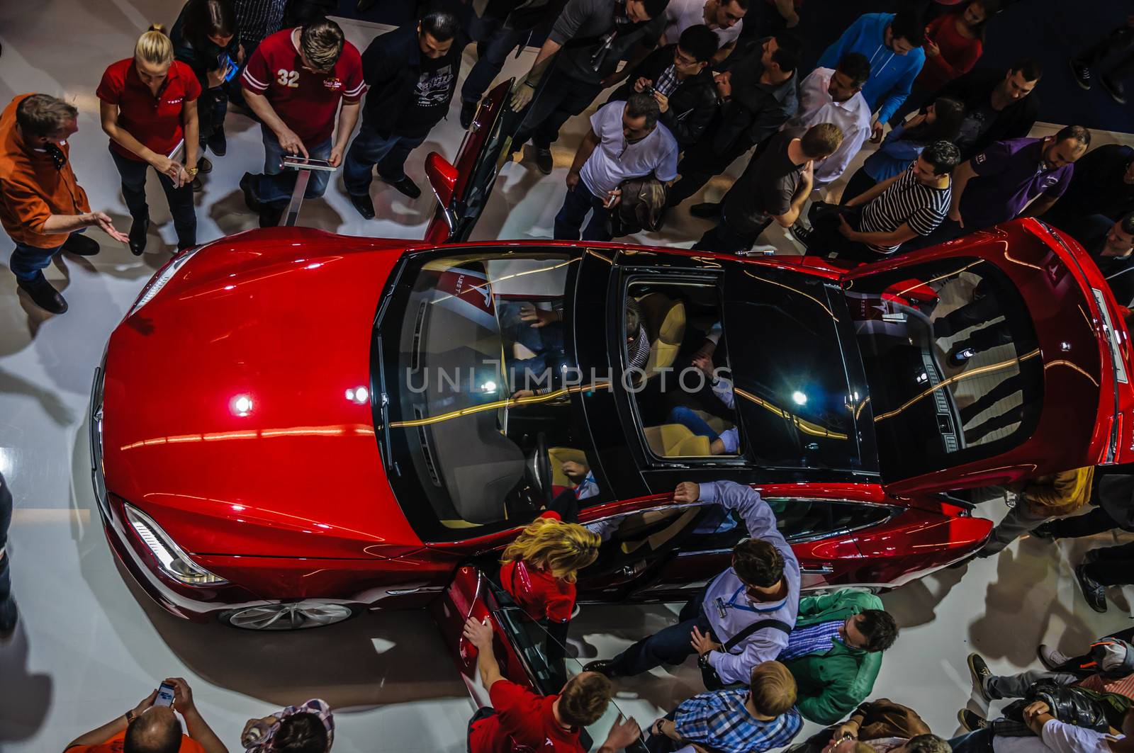 FRANKFURT - SEPT 21: new 2014 Tesla Model S eletric auto presented as world premiere at the 65th IAA (Internationale Automobil Ausstellung) on September 21, 2013 in Frankfurt, Germany