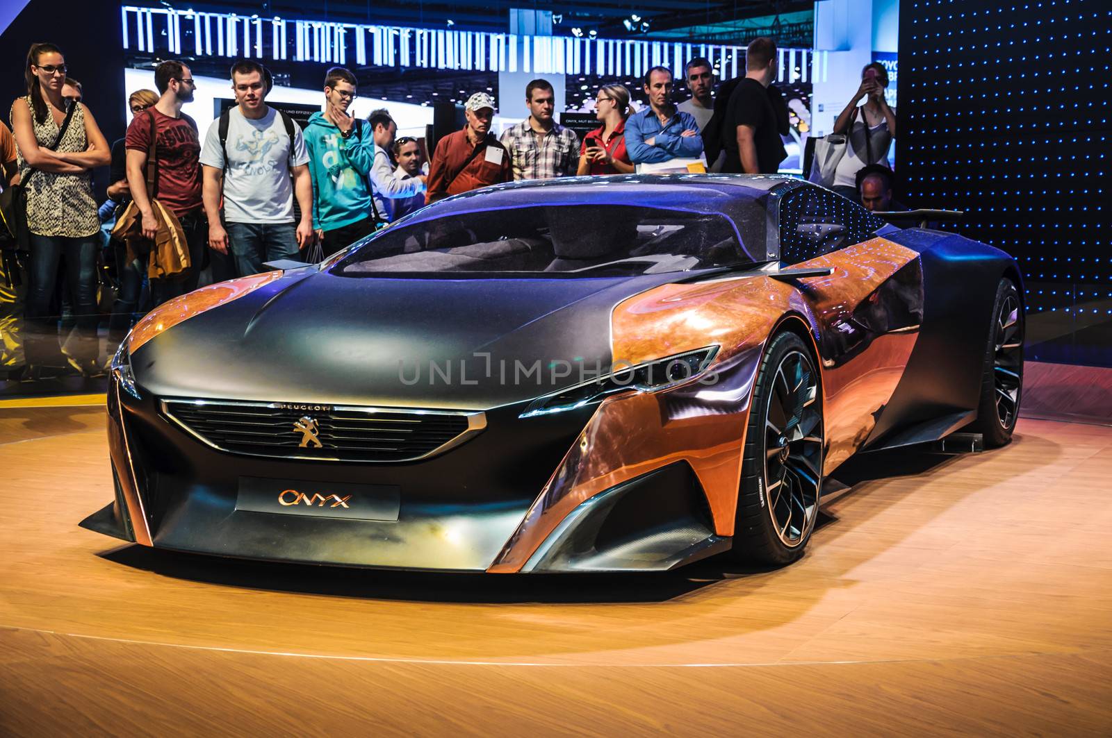 FRANKFURT - SEPT 21: Peugeot Onyx hybrid supercar (conceptcar) presented as world premiere at the 65th IAA (Internationale Automobil Ausstellung) on September 21, 2013 in Frankfurt, Germany