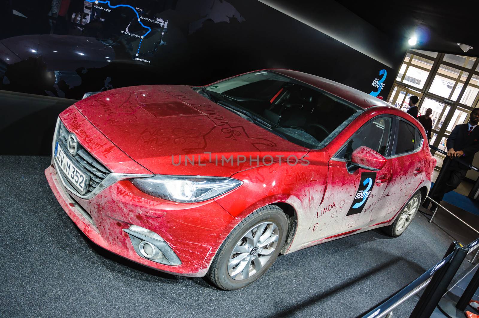 FRANKFURT - SEPT 21: MAZDA 3 HATCHBACK presented as world premiere at the 65th IAA (Internationale Automobil Ausstellung) on September 21, 2013 in Frankfurt, Germany