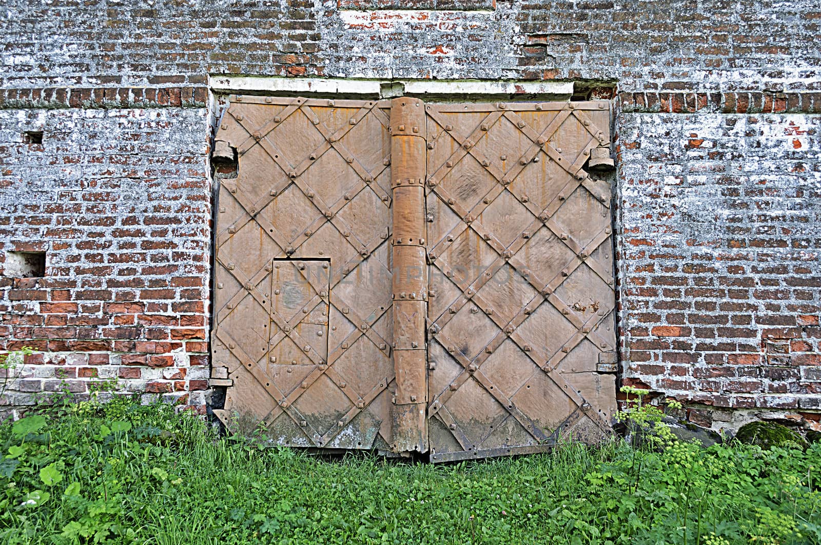 Old metal gate in ancient Kirillo-Belozersky monastery, Russia