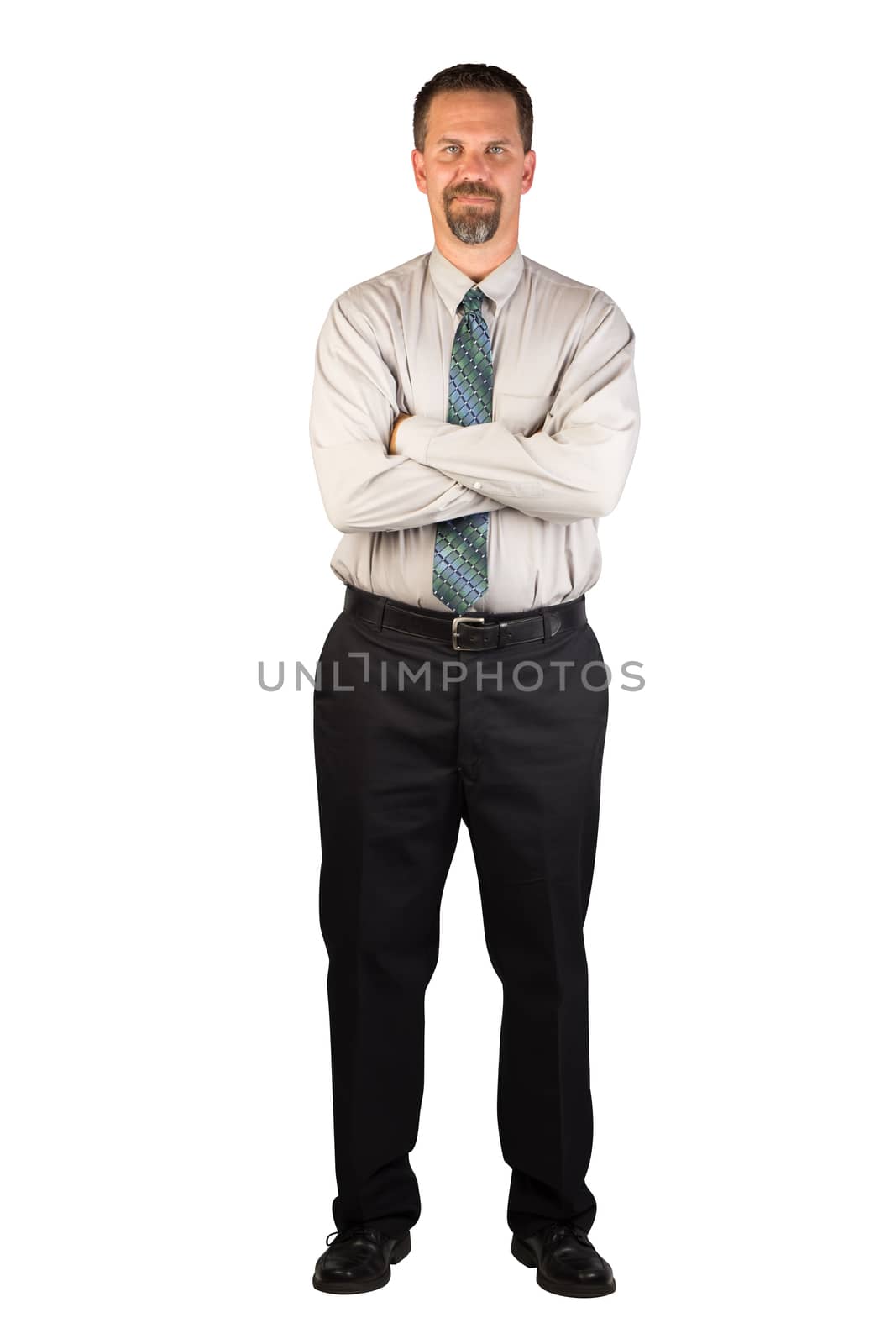 A white collar worker standing facing the camera with a strong stance of confidence. This man could be a corporate person that could deal with insurance, finance, real estate, stock market, restaurant industry, home improvement industry or other industries.