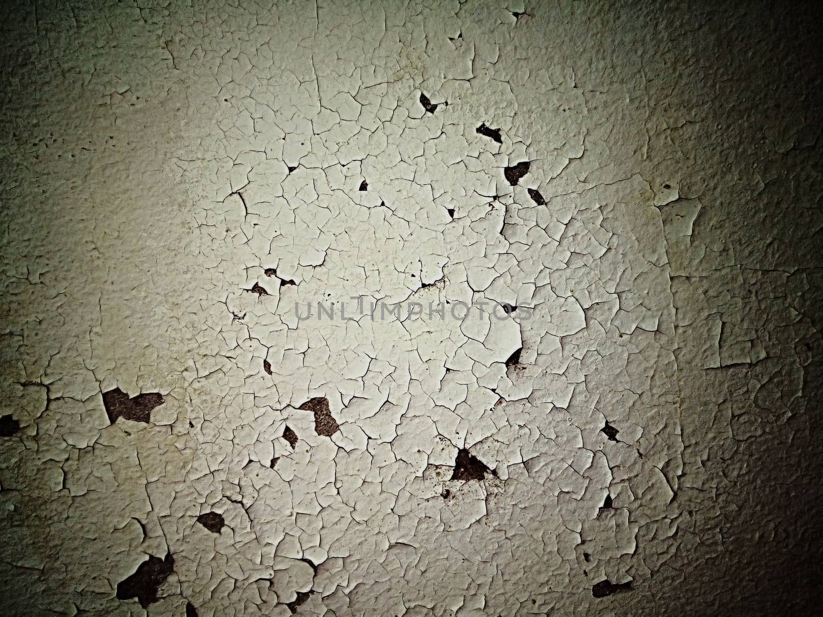 cracked and peeling paint and grunge old wall with texture