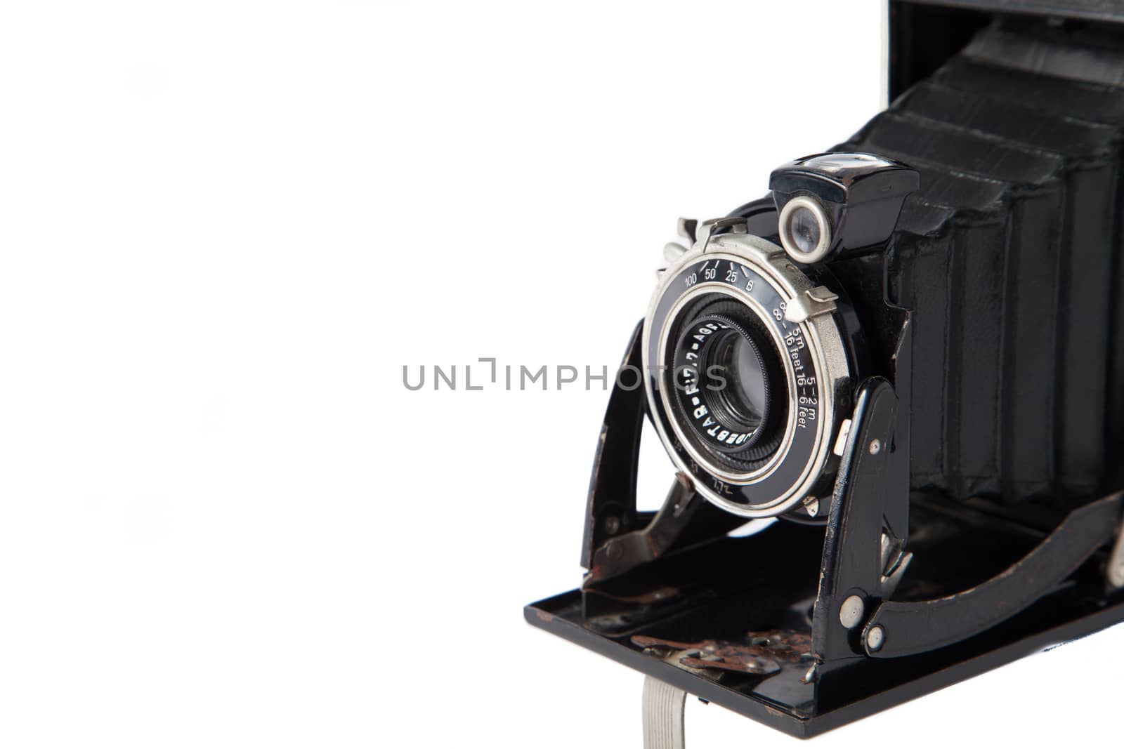 Old vintage camera on white background