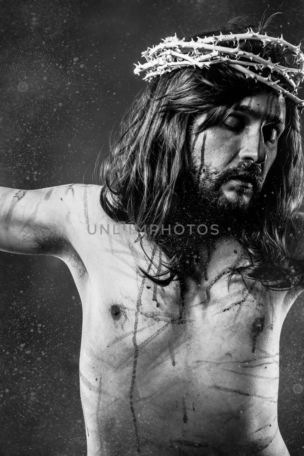 Jesus Christ calvary, man bleeding, representation of passion with crown of thorns