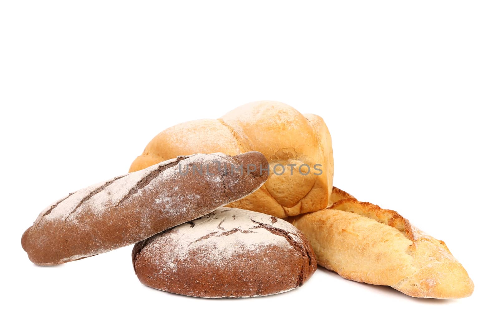 Brown and white loafs of bread. White background.