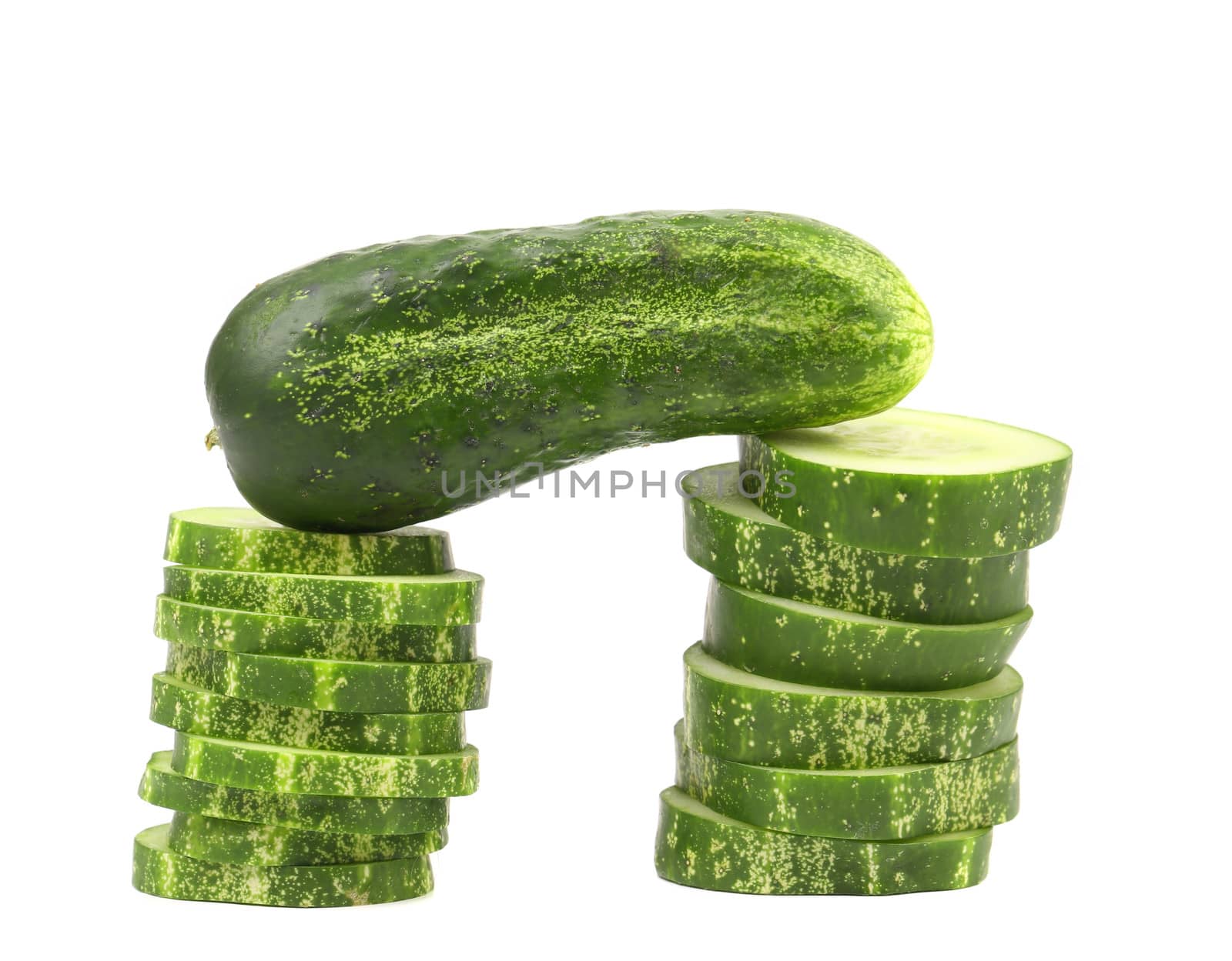 Gate of chopped cucumber. Isolated on a white background.