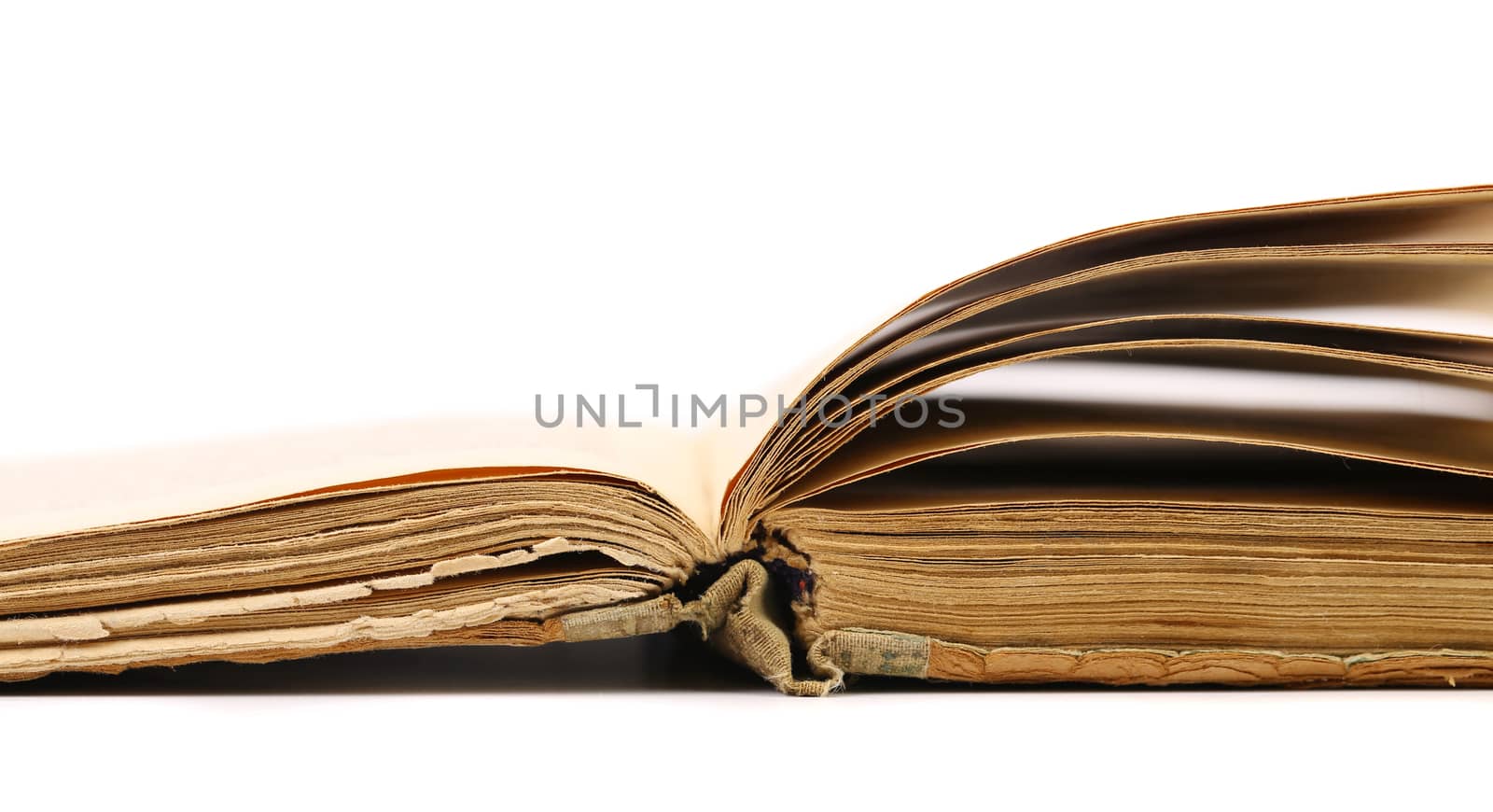 Opened old book. Isolated on a white background.
