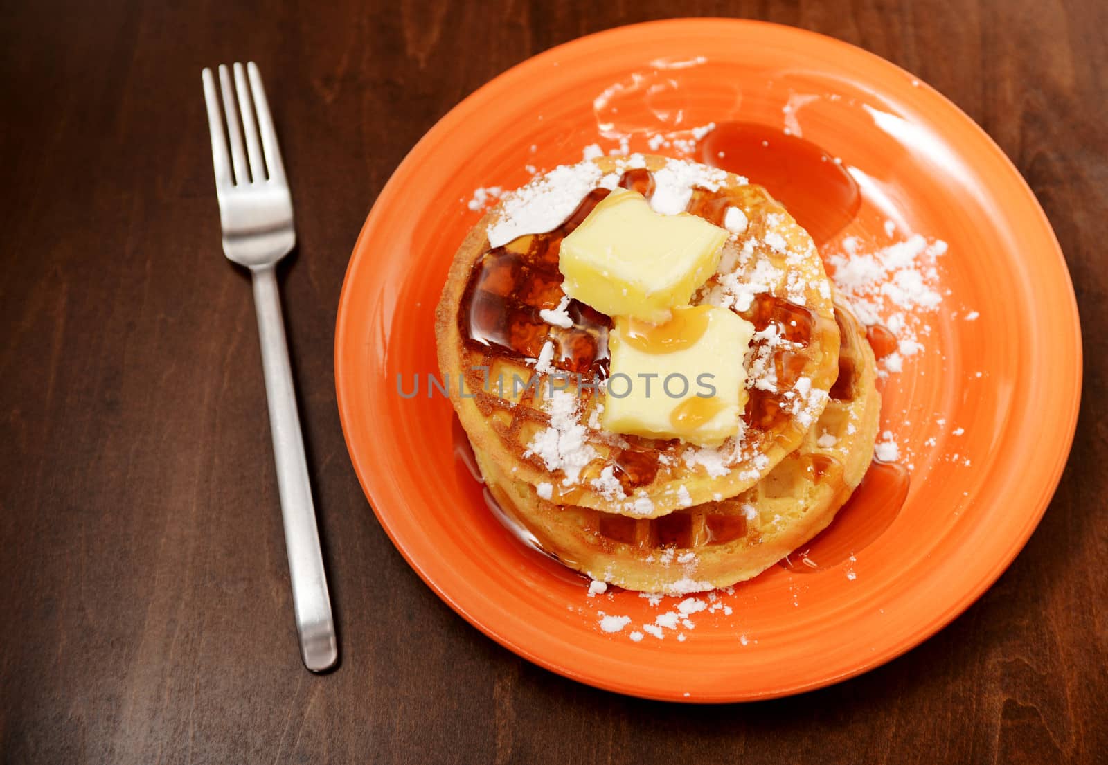 waffles with powdered sugar and syrup by ftlaudgirl