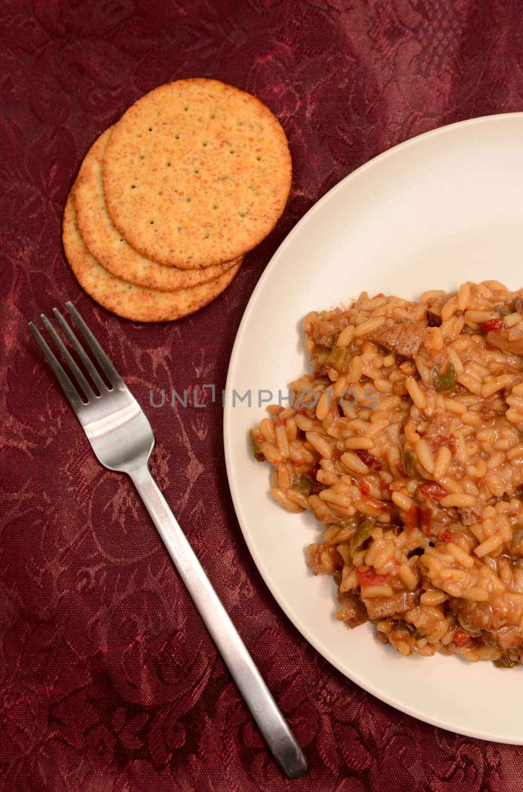 delicious beef rice dish with crackers for dinner