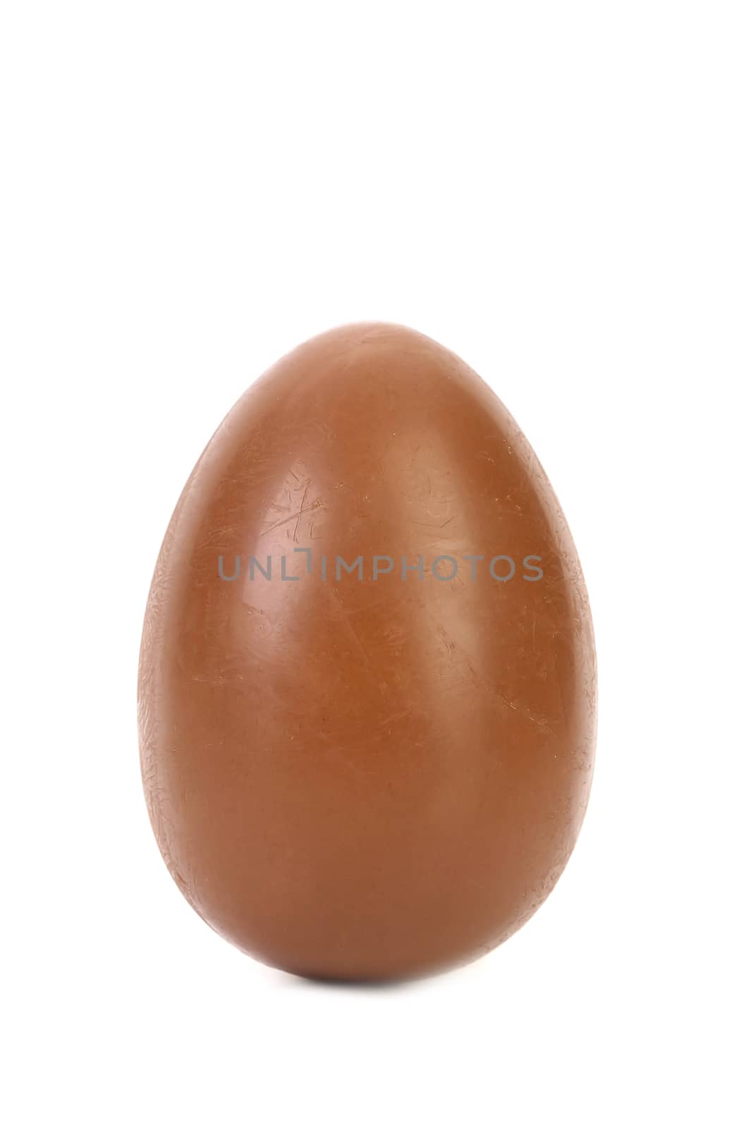 Single chocolate egg. Isolated on a white background.