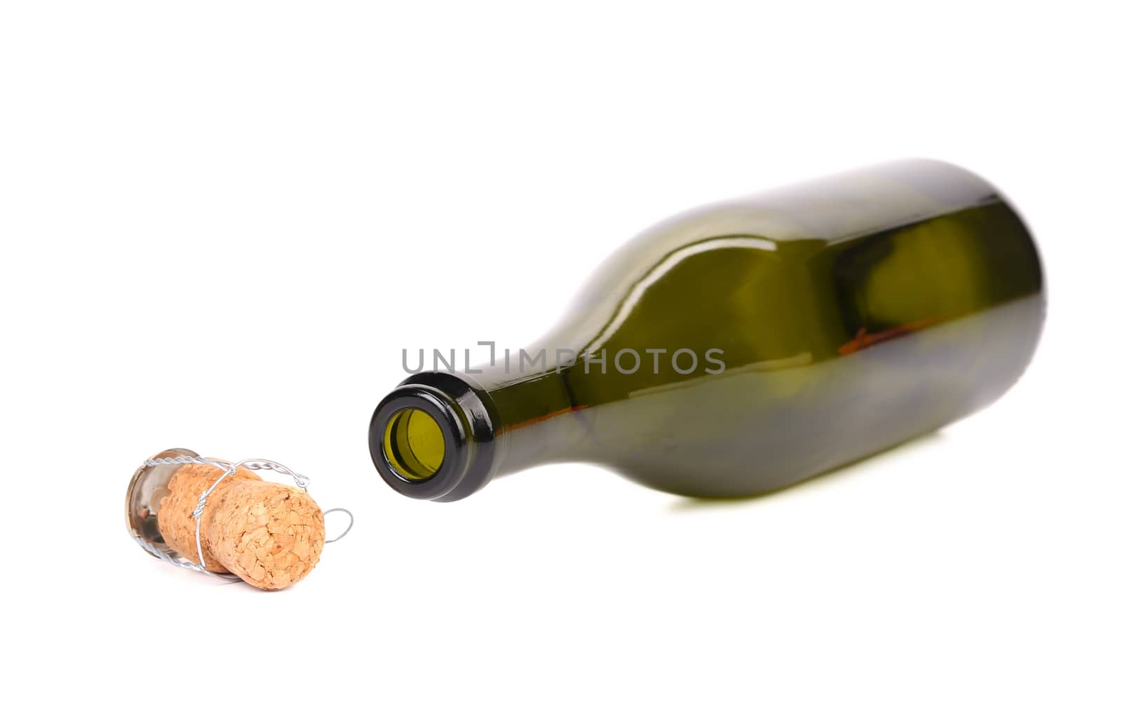 Empty bottle of champagne and muzzle with cork. White background.