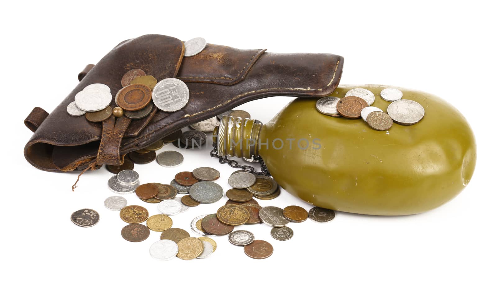 Gun and flask on coins. White background.