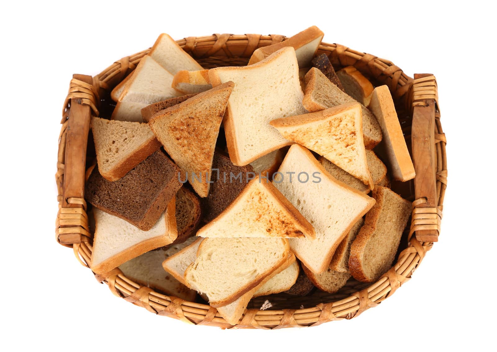 Full basket of different sliced ??bread. White background.