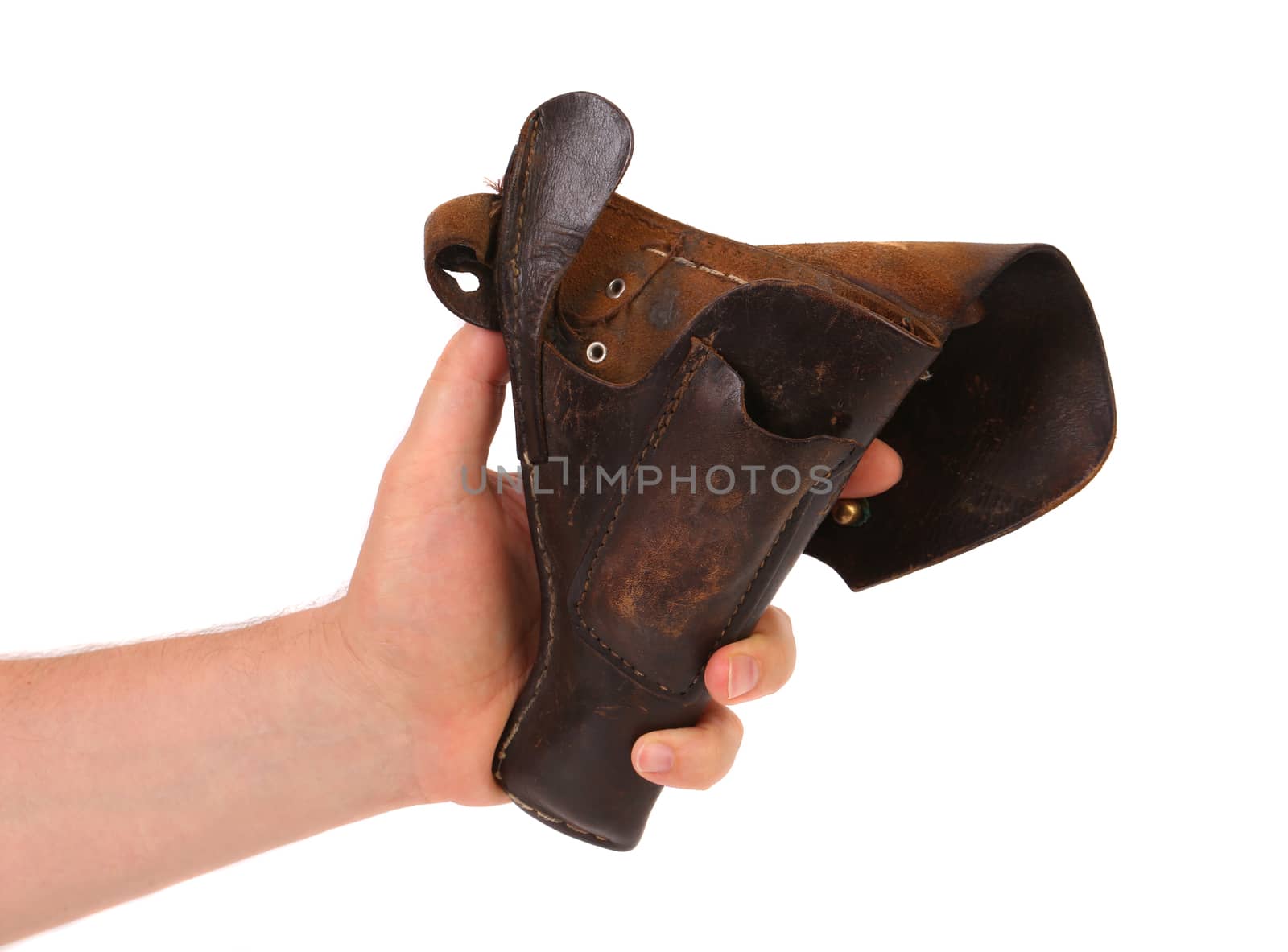 Hand holds old brown holster. White background.