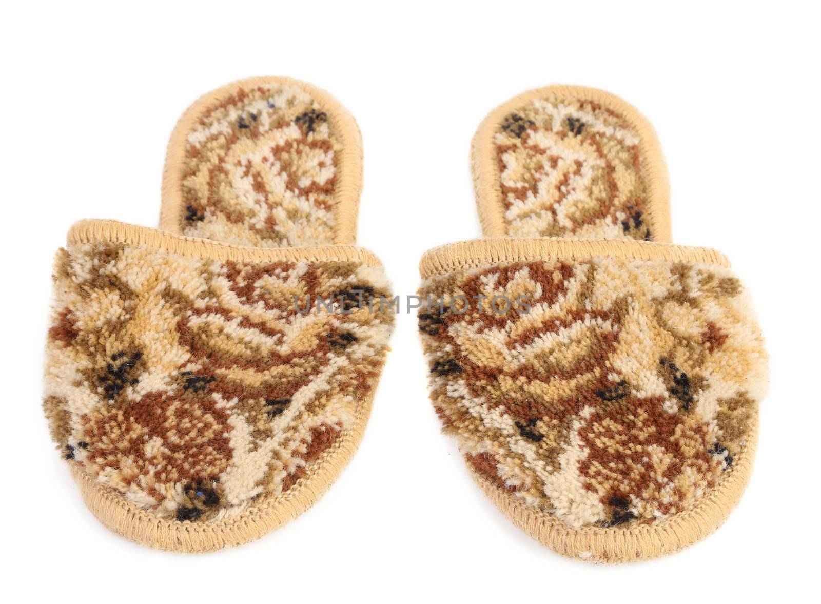 Fur house slippers isolated on a white background