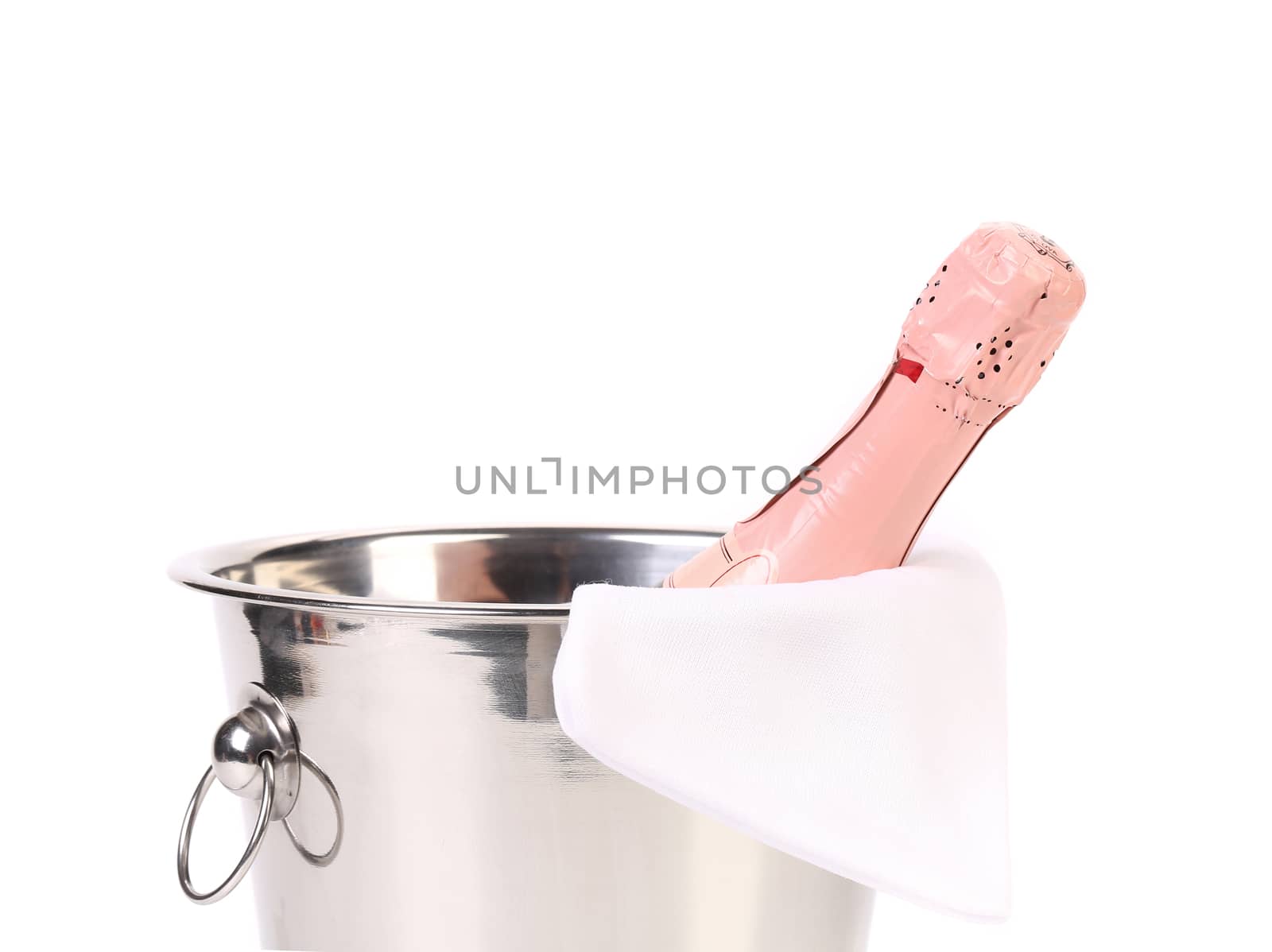 Bottle of champagne in cooler. Whitte background.