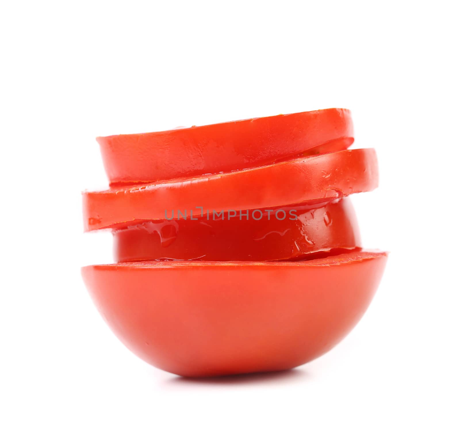 Stack of sliced tomato. Isolated on a white background.