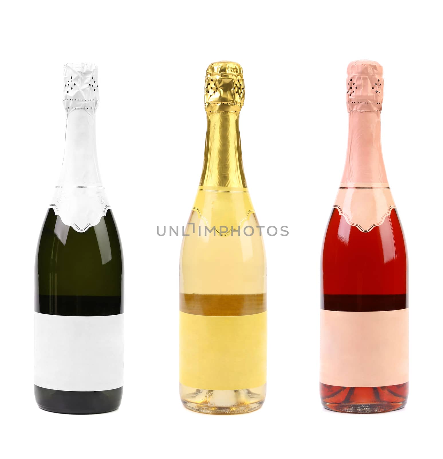 Three different bottles of champagne. White background.
