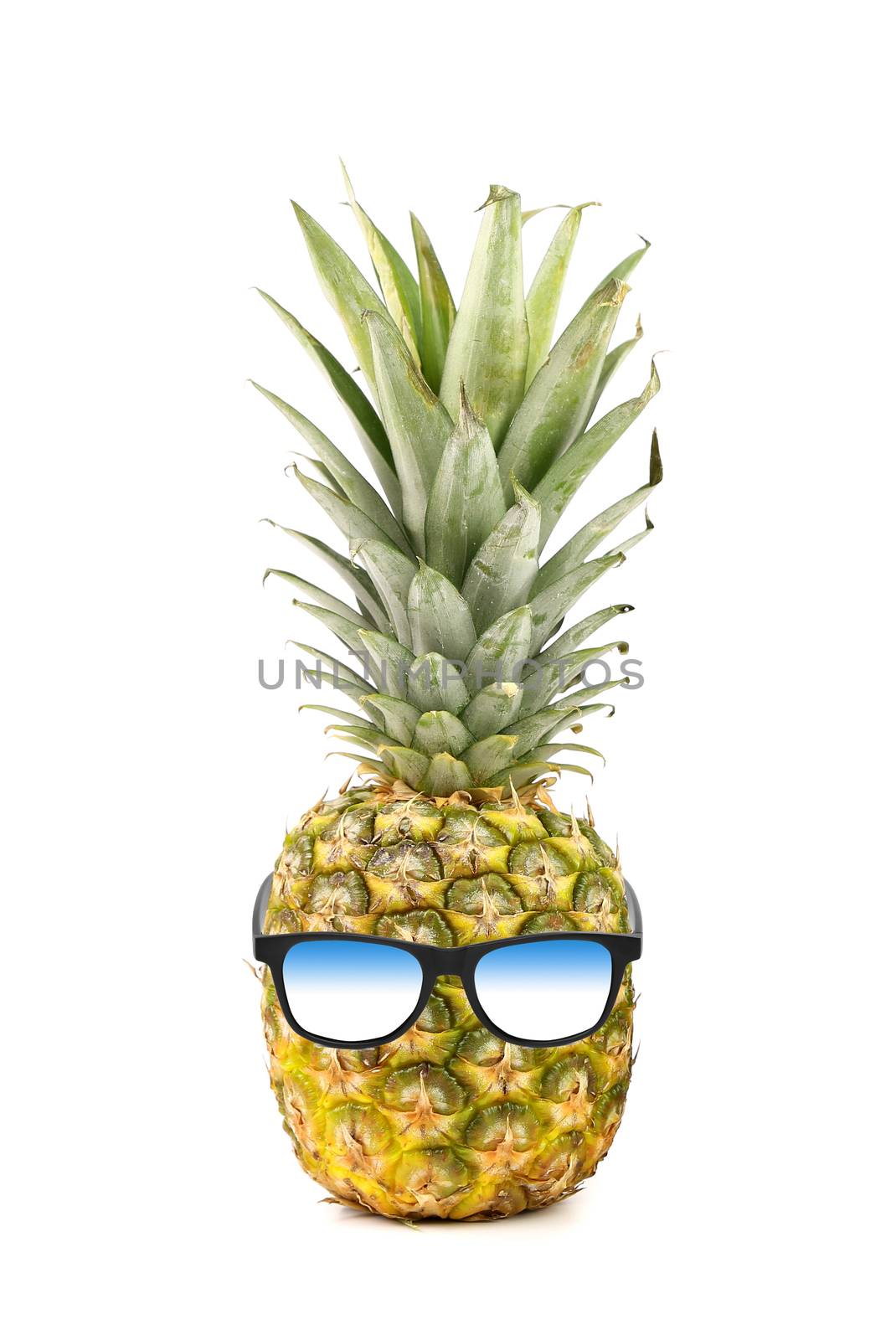 Funny pineapple with sunglasses isolated on a white background