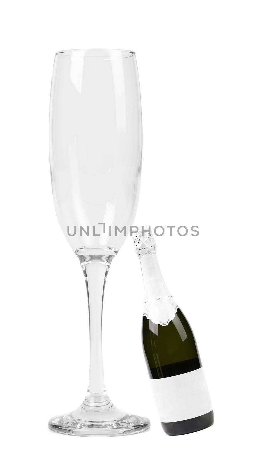 Big glass and little bottle of champagne. White background.
