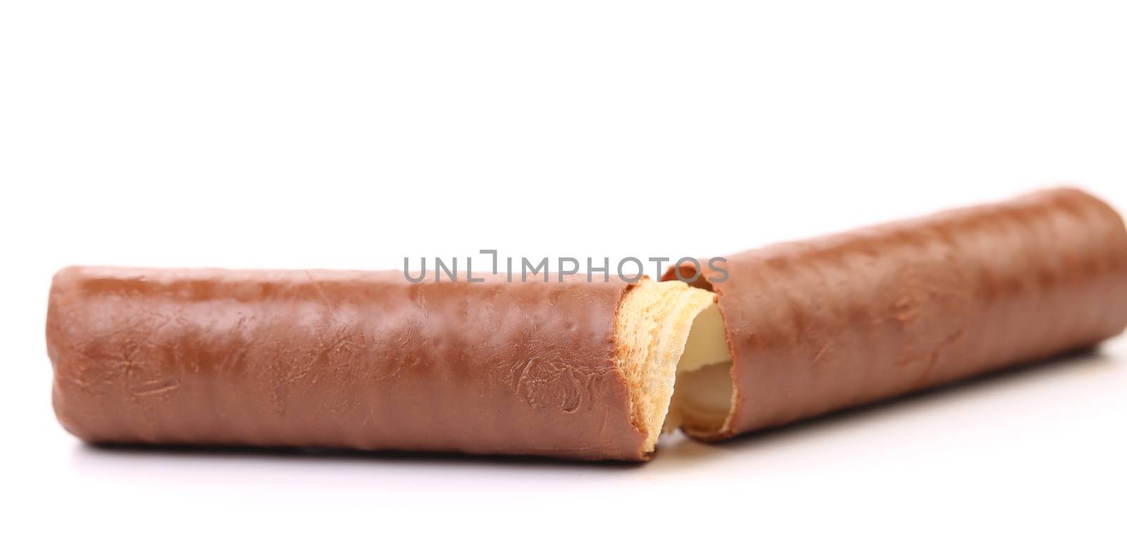 Broken waffle roll coated chocolate. White background.