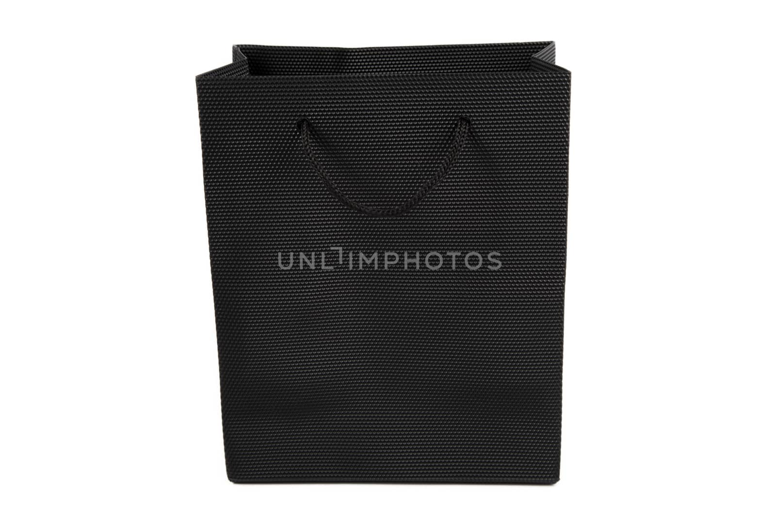 Black shopping bag with handles isolated on a white background