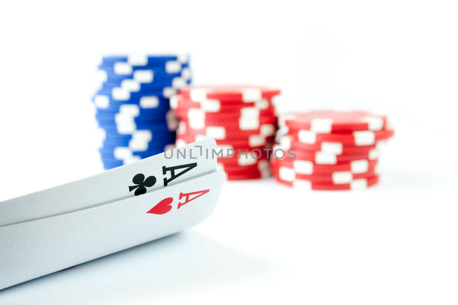 Pair of aces with casino chips