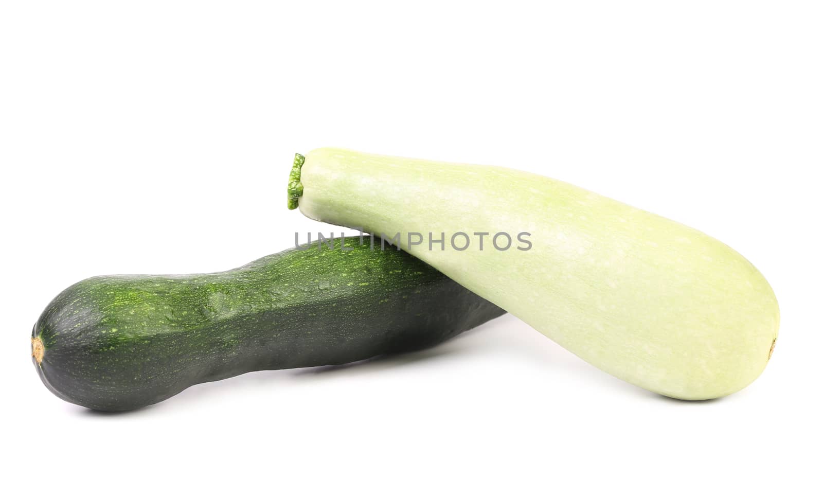 Two fresh courgettes isolated on a white