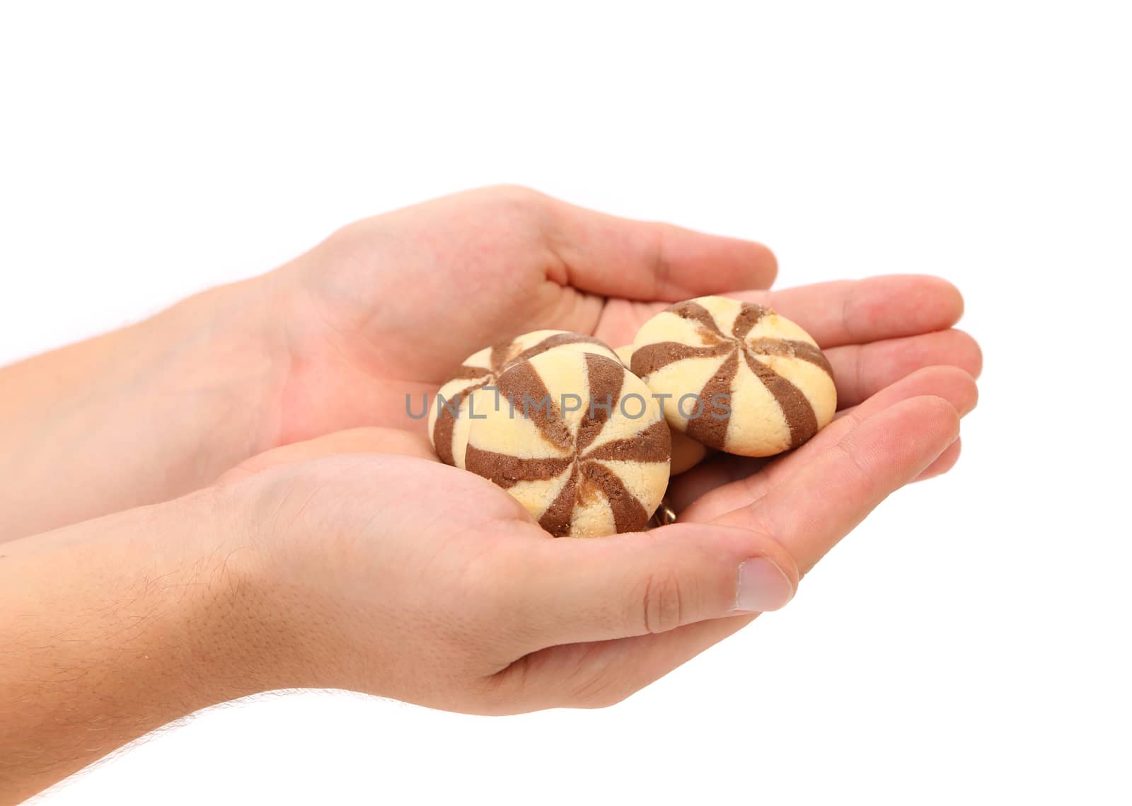 A handful of biscuits of a chocolate cloves.