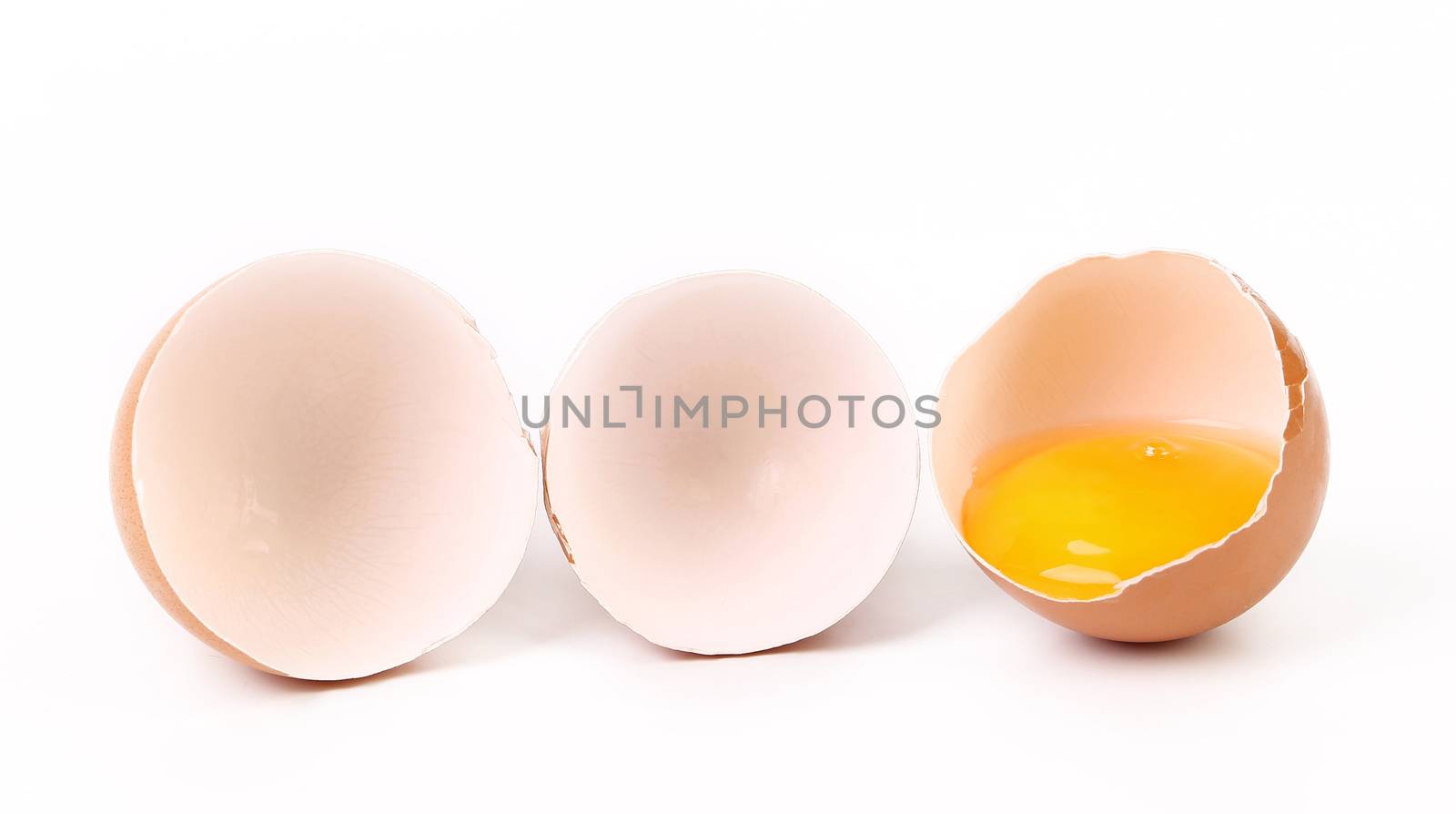 Broken egg isolated on a white background