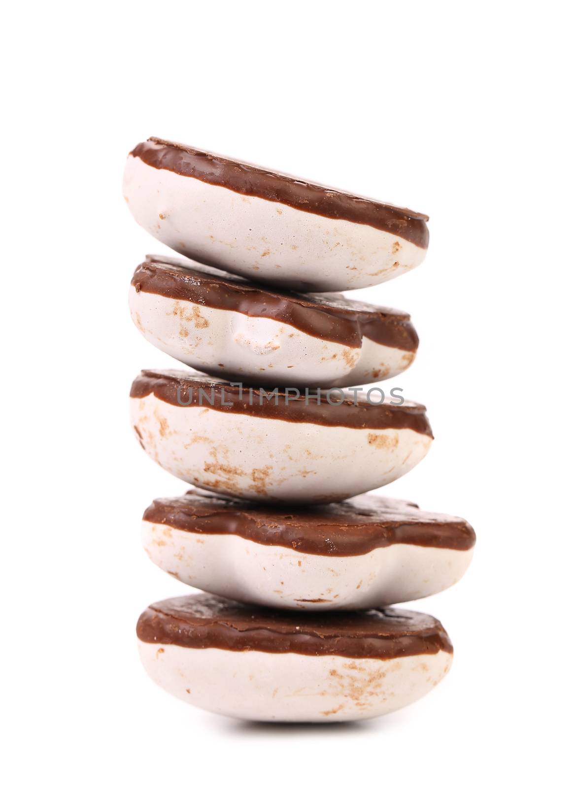 Stack of heart shape chocolate meringues. Isolated