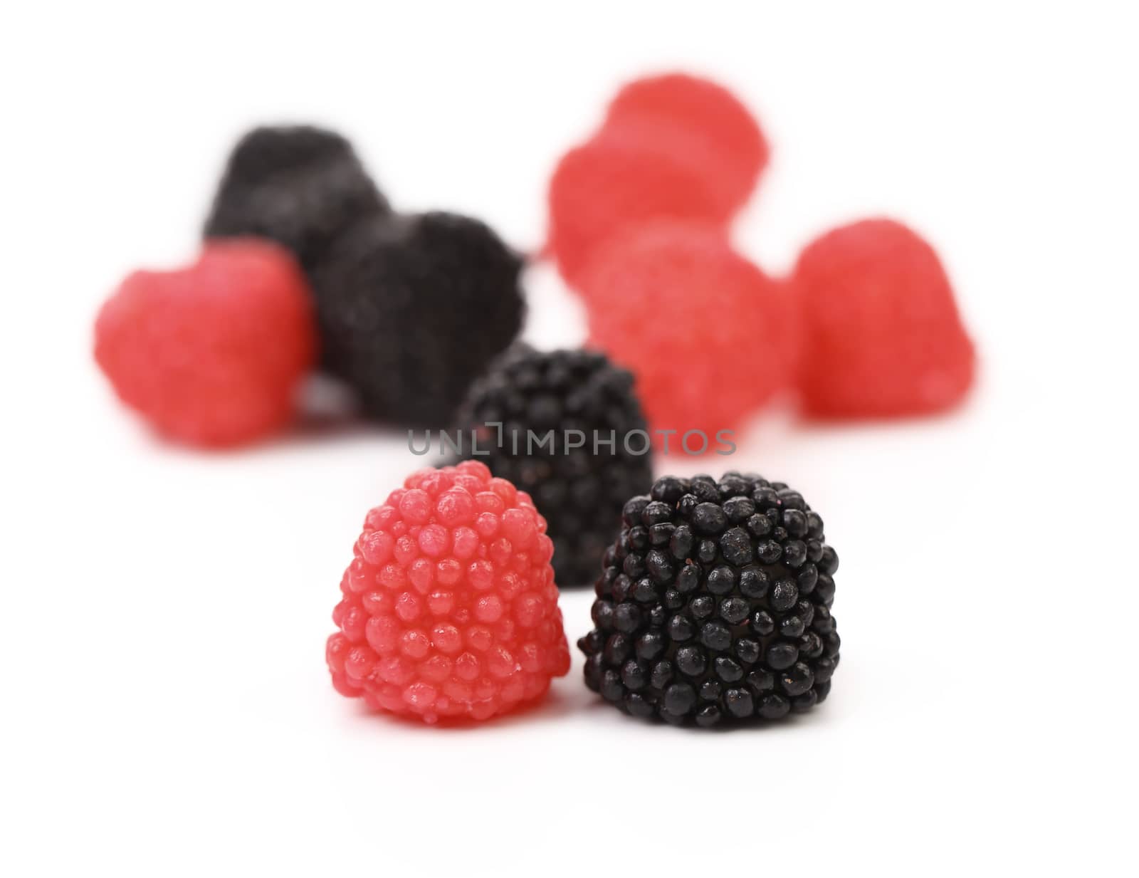 Marmelade blackberries and raspberries on white background