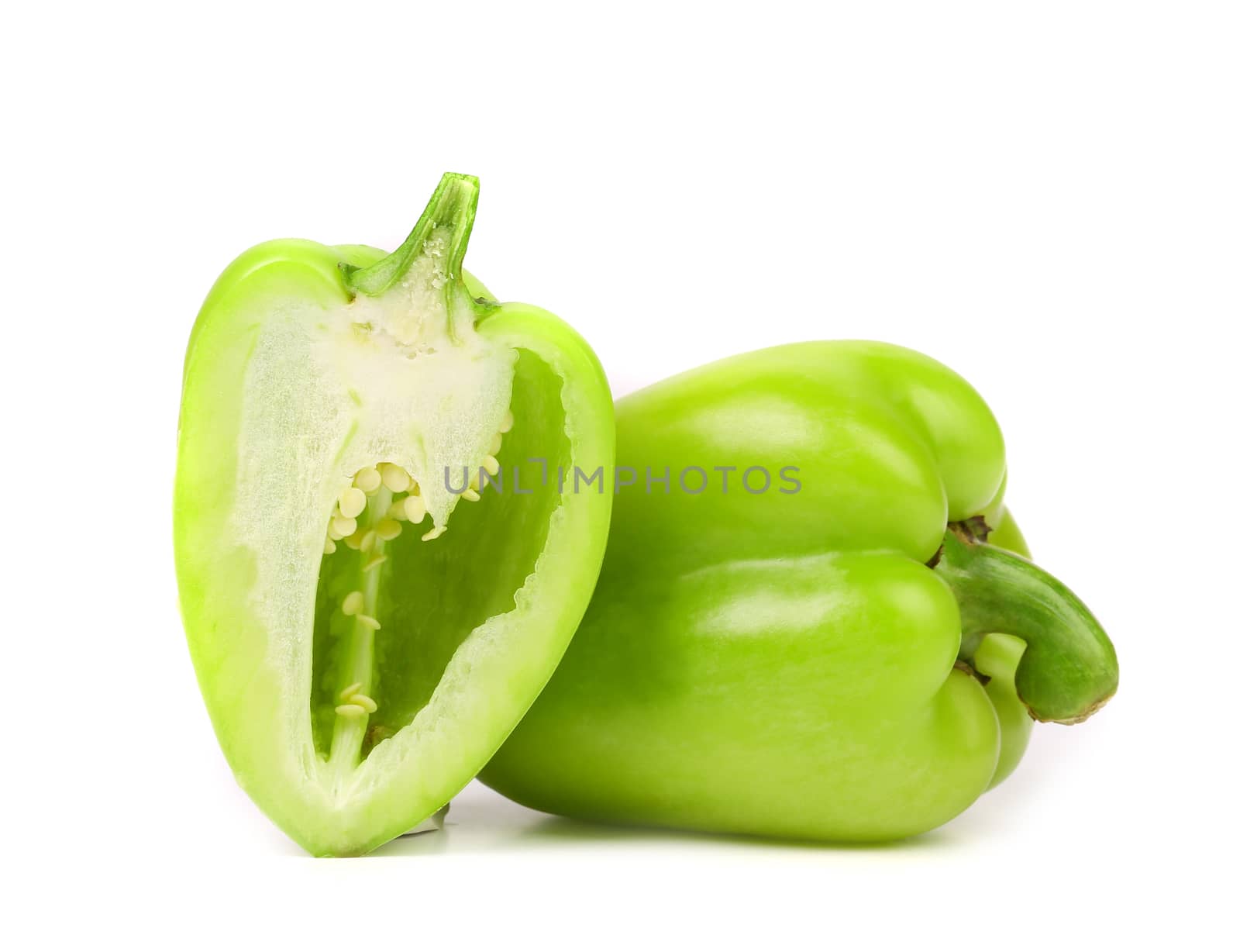 Green bell pepper isolated on a white background