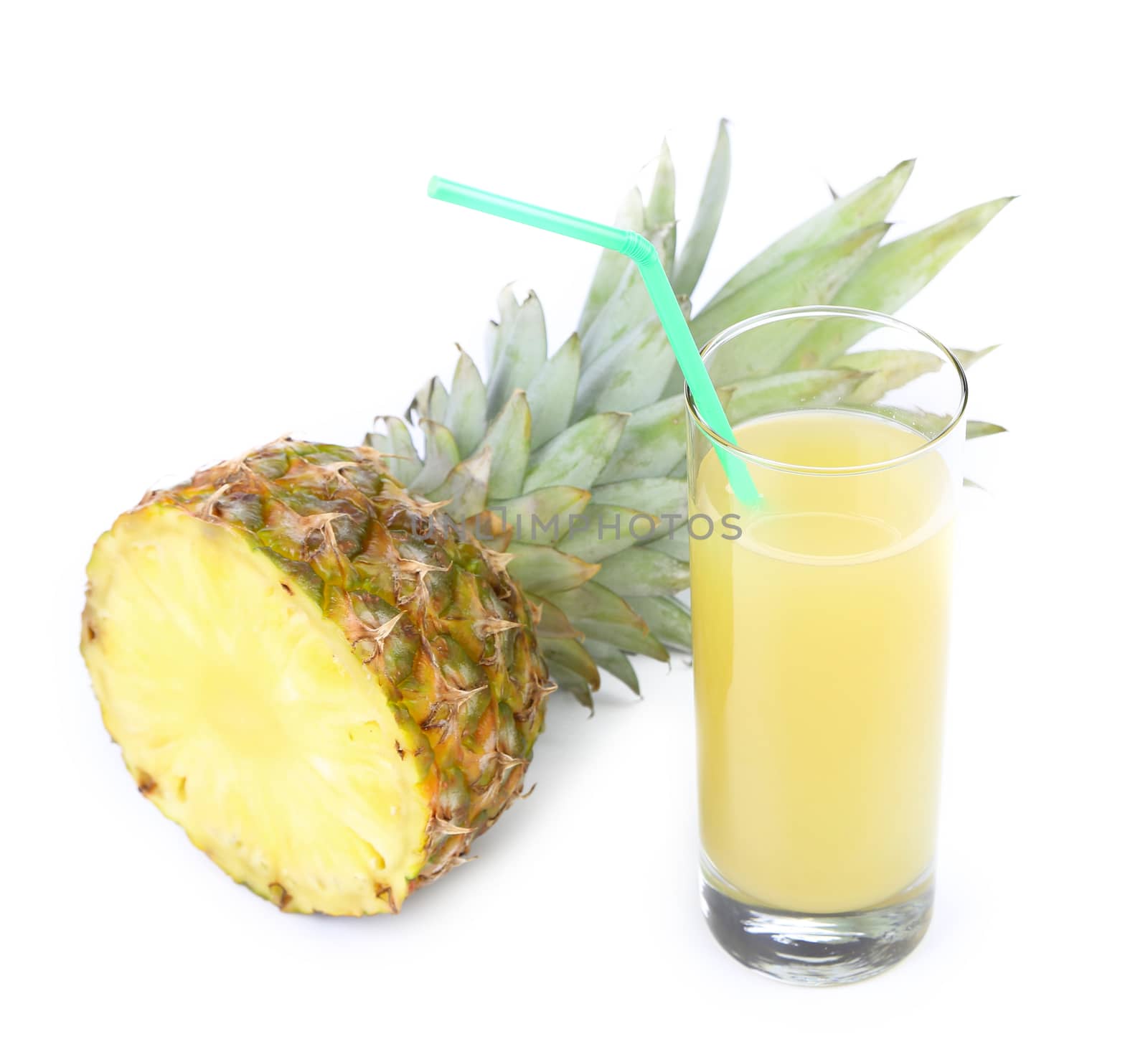 Glass of juice and pineapple isolated on white background