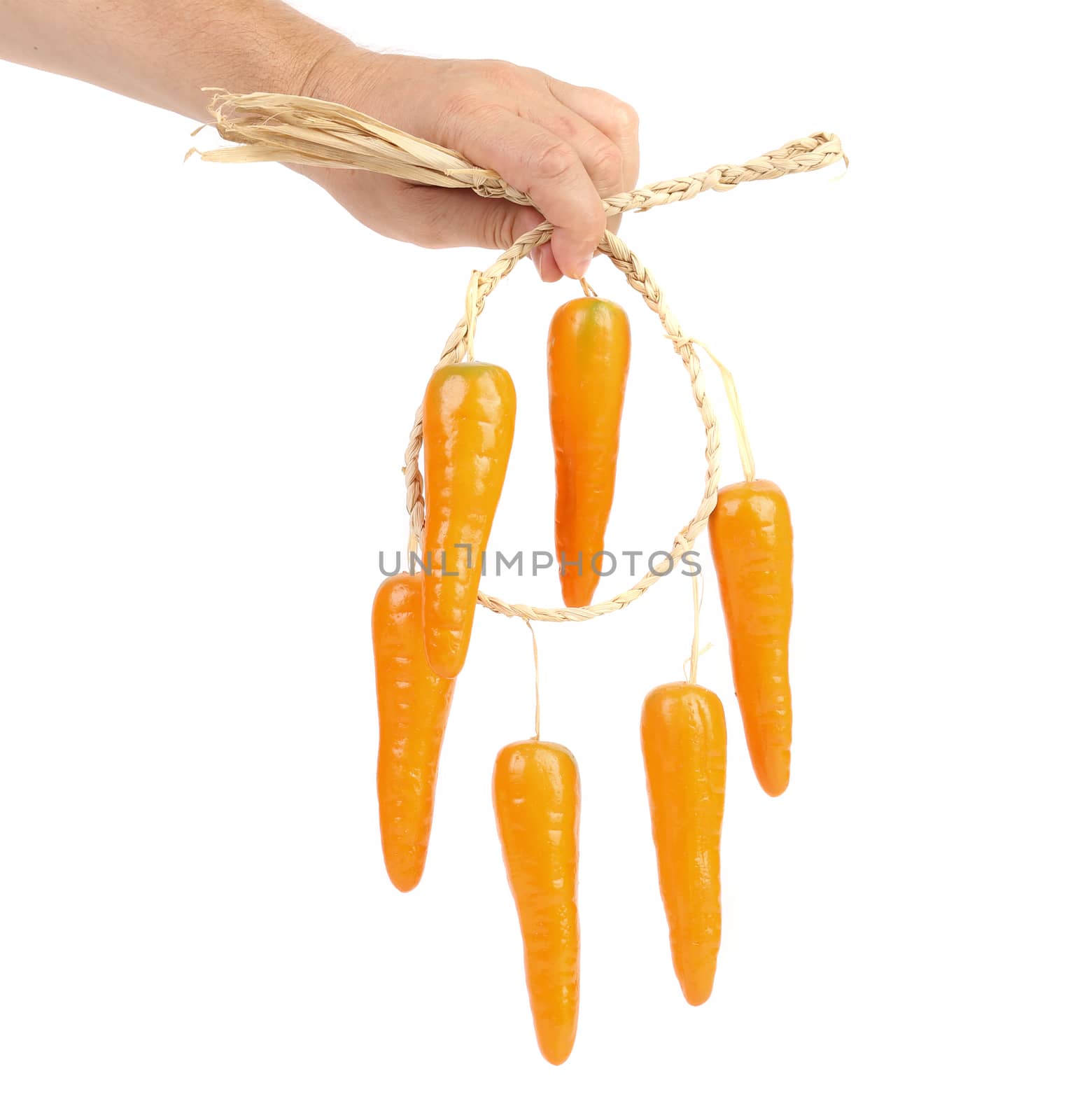 Close-up of a toy carrot isolated on a white