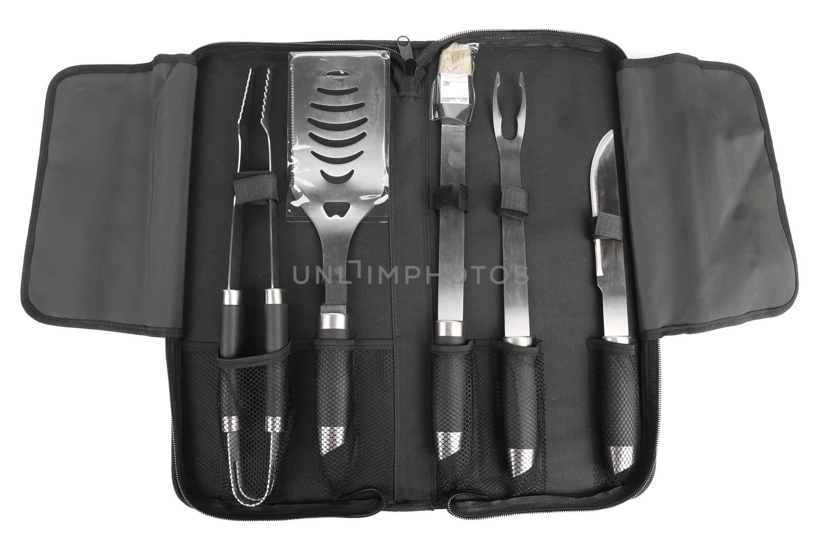 Set of tools for bbq in black bag. Isolated
