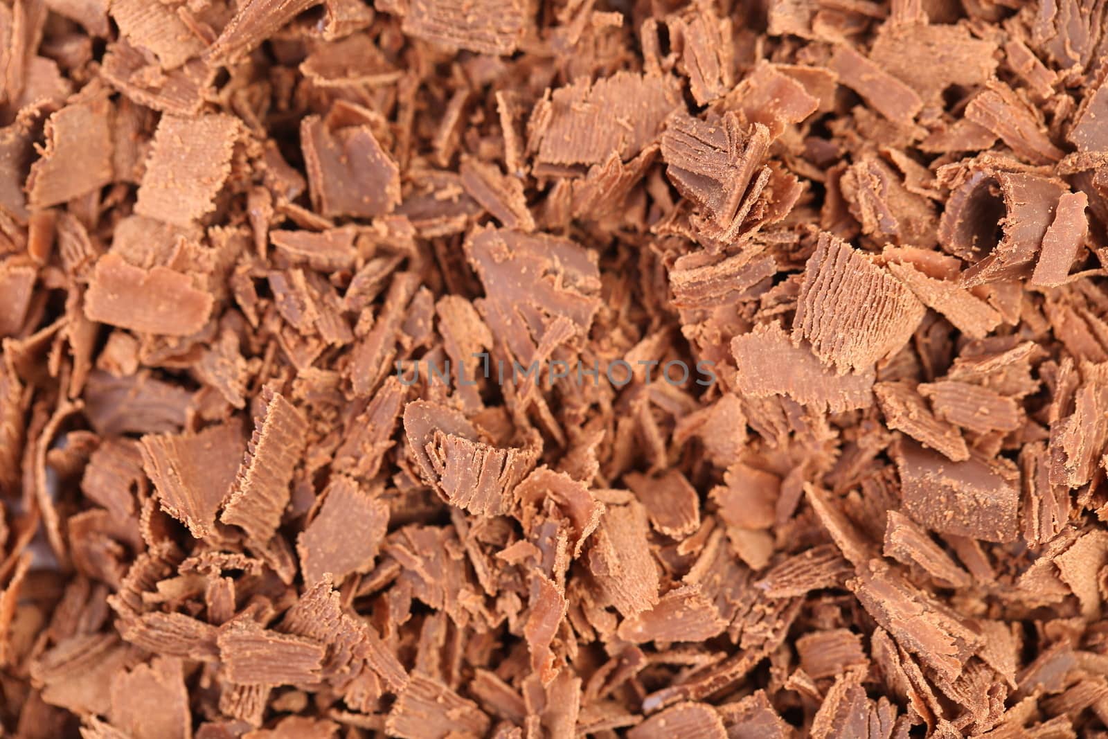 Slices of chocolate. Macro. on white background