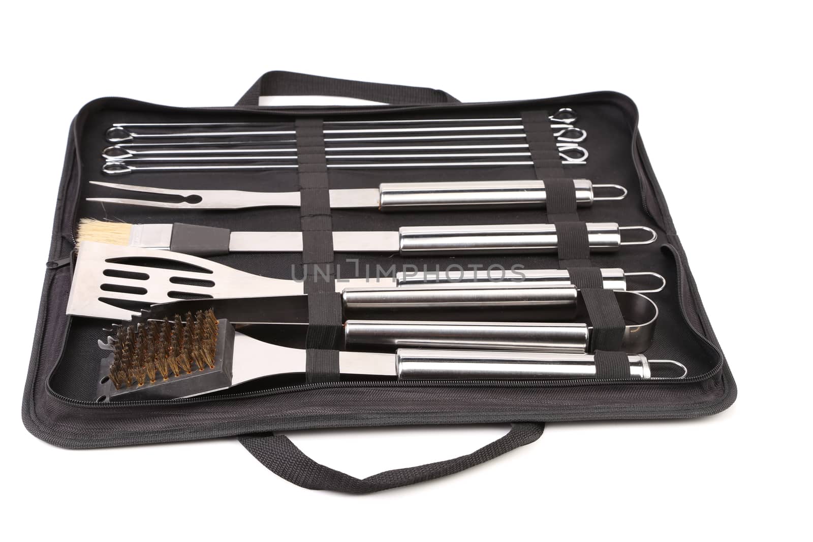 Set of tools for bbq in black bag. White background.