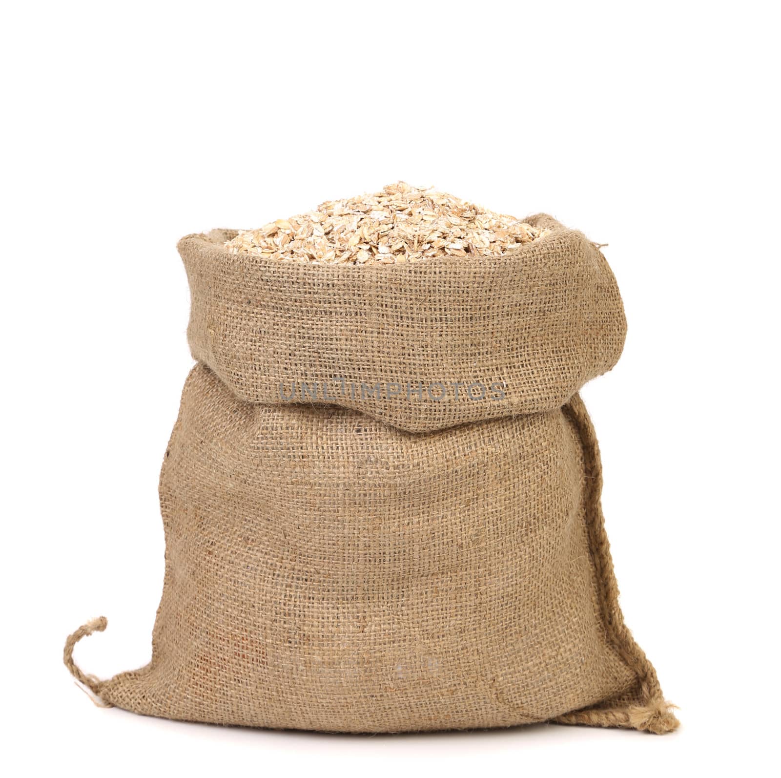 Oatmeal flakes isolated on a white background