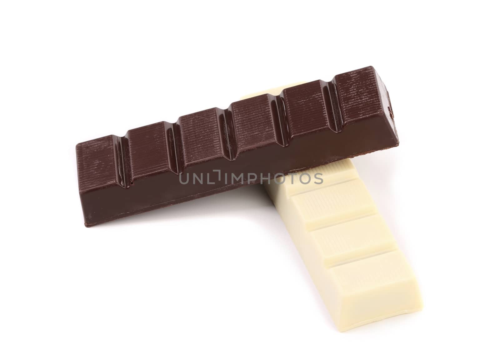 Black and white chocolate bars with filling. White background.